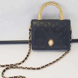 Adolfo Black and Gold leather quilted mini bag with pearl and braided chain